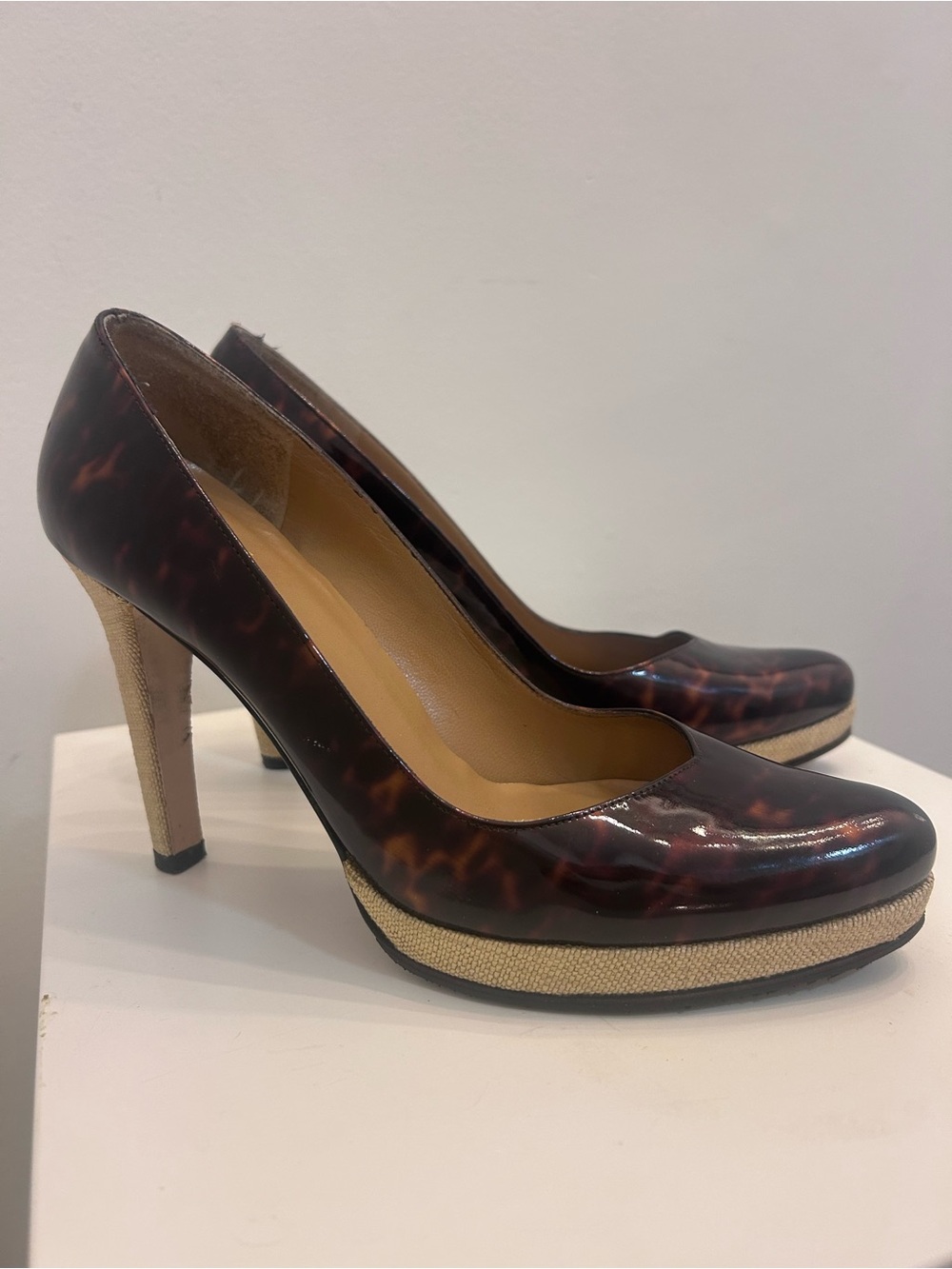 Stuart Weitzman Tortoiseshell Platform Pumps with jute base